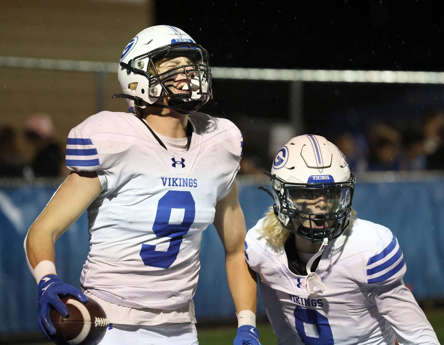 Geneva's Michael Loberg (9) celebrates his touchdown with Finnegan Weppner (8) during the IHSA Class 6A playoff game Friday November 3, 2023 in Lake Forest.