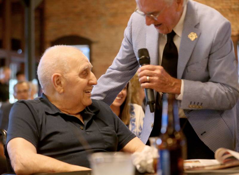 Tony Causa speaks with emcee Lanny Slevin after receiving  Lanny Slevin Lifetime Achievement Award during the  Illinois Valley Sports Hall of Fame awards banquet on Thursday, June 6, 2024 at the Auditorium Ballroom in La Salle.