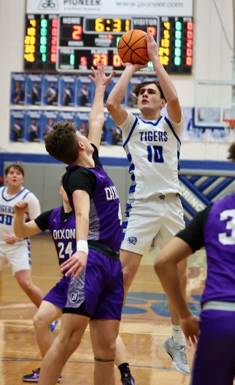 Princeton's Gavin Lanham shoots over Dixon's Brody Nicklaus Monday night at Prouty Gym. The Dukes won 61-50.