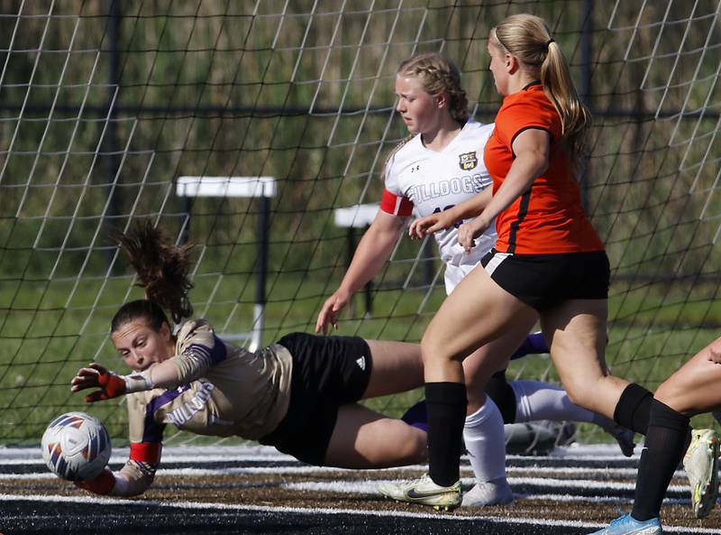 Wauconda's Lily Schmidt tries to block the ball as Crystal Lake Central's Brooklynn Carlson (right) runs after the ball during the IHSA Class 2A Grayslake North Regional championship soccer match on Friday, May 17, 2024, at Grayslake North High School.