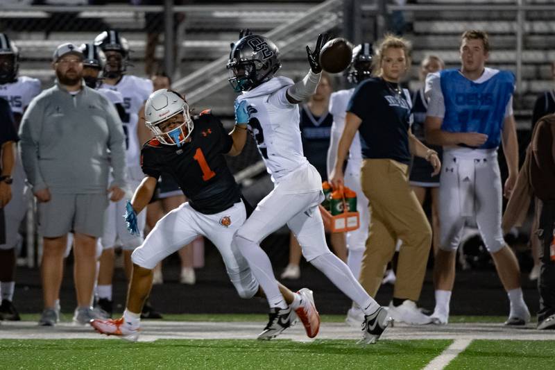 Oswego East;s Jasiah Watson breaks up a pass intended for Plainfield East's Jayden Cawthon during a game on Thursday Sept. 12, 2024 at Plainfield East High School