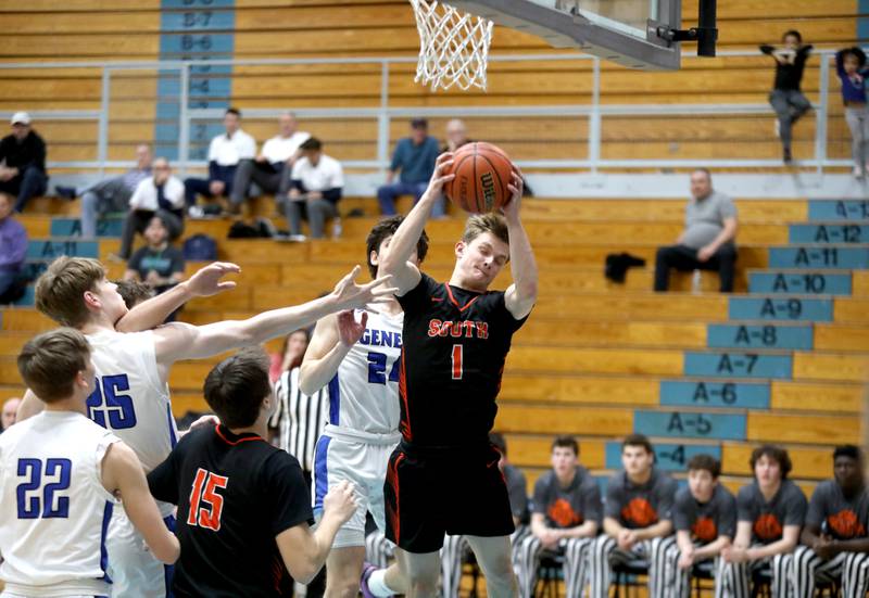 Wheaton Warrenville South’s Brooks Becker grabs a rebound during a Class 4A Willowbrook Regional semifinal game against Geneva on Wednesday, Feb. 21, 2024.