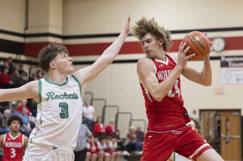 Morrison’s Brenden Martin takes a pass against Rock Falls’ Ryken Howard Wednesday, Feb. 21, 2024 at the Prophestown class 2A basketball regional.