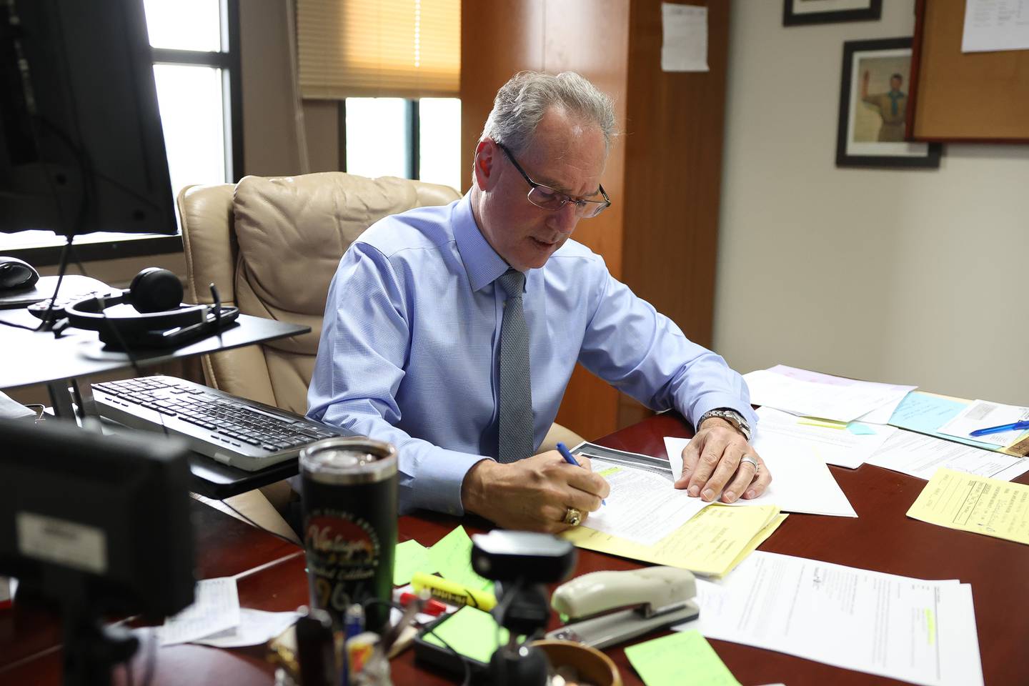 Joliet attorney Frank Andreano makes notes on a document in his office on Thursday, May 16, 2024.