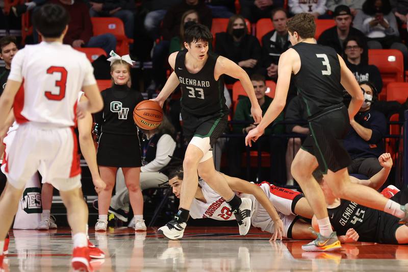Glenbard West’s Bobby Durkin rolls out of the paint after a rebound against Bolingbrook in the Class 4A semifinal at State Farm Center in Champaign. Friday, Mar. 11, 2022, in Champaign.