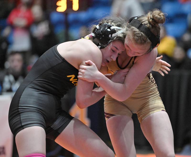 Glenbard North’s Gabby Gomez and Loyola’s Harlee Hiller complete in the 115-pound bout at the girls wrestling state finals at Grossinger Motor Arena in Bloomington on Saturday, Feb. 24, 2024.