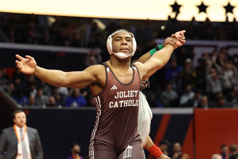 Joliet Catholic’s Dillan Johnson wins his fourth state title win his win over Hinsdale Central’s Marko Invanisevic in the 285-pound Class 3A state championship match on Saturday, Feb. 17th, 2024 in Champaign.