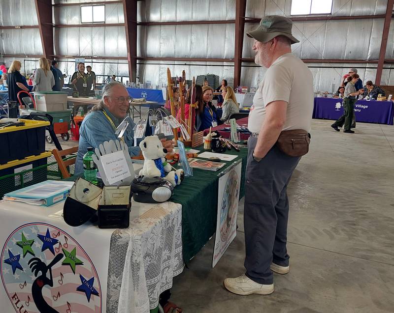 Flutes for Vets was among the many booths Thursday, May 16, 2024, at the Veterans Expo at the Illinois Valley Regional Airport in Peru.