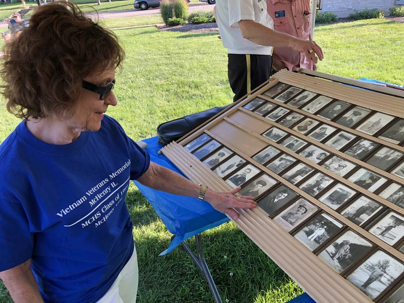 Ruthie Granger found a photo of her aunt, a nurse in World War II, among the photos at McHenry's annual Keep the Spirit of '45 Alive event, Sunday, Aug. 11, 2024. Originally hung at the Mi-Place Restaurant and Tavern, the photos will be relocated to the McHenry VFW Post 4600 once the proper location is found to hang them.