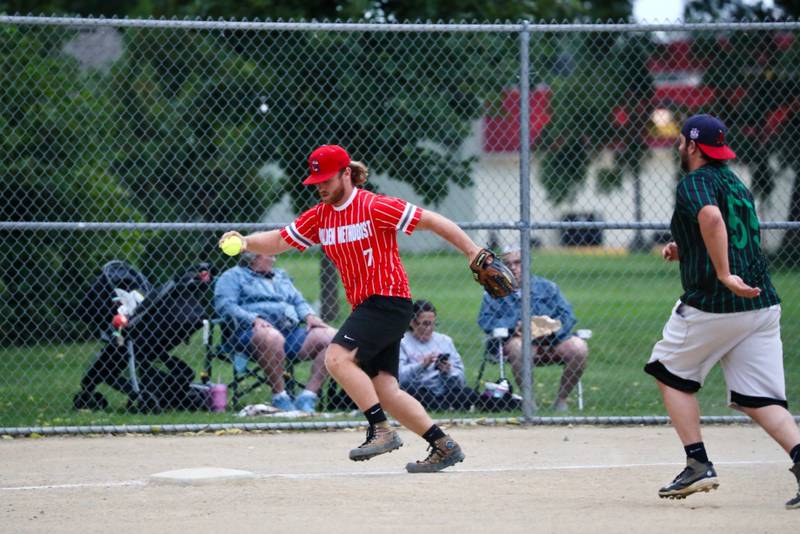 Malden Methodist third baseman Jett Wedekind steps on the bag for a force out in Tuesday's Princeton Park District Fastpitch League championship game opener Tuesday night at Westside Park.