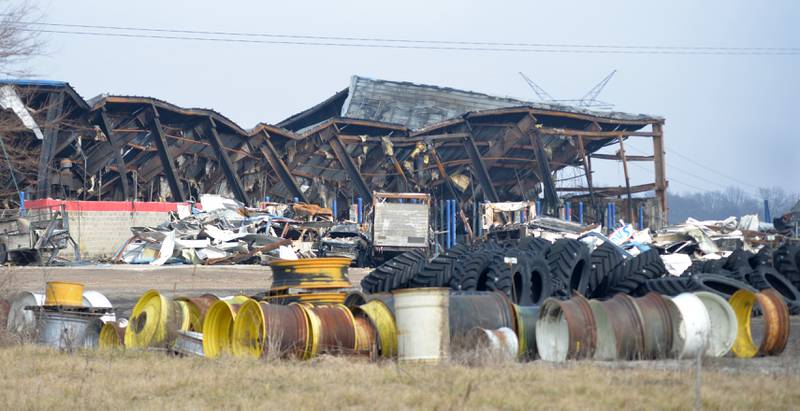 Tires lay in the parking lot surrounding the old Moore Tires' Rock Falls location on Tuesday, Feb. 6, 2024. The shop, located at at 2411 E. Rock Falls Road/U.S. Route 30, was destroyed by a fire on Jan. 16. Rock Falls firefighters were called about 4:25 a.m. to the 70,000-square-foot facility.