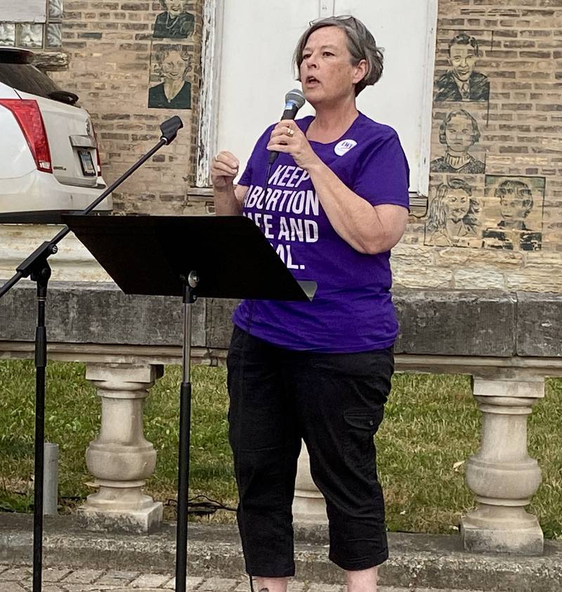 Rockford-based immigration lawyer and League of Women Voters member, Sara Dady, speaks to a crowd gathered in downtown DeKalb on Saturday, June 22, 2024, for a Rally for Reproductive Rights. Organizers said the event was held to mark two years since the U.S. Supreme Court overturned federal protections for abortion access, and to help mobilize voters to support pro-abortion candidates ahead of the November election.