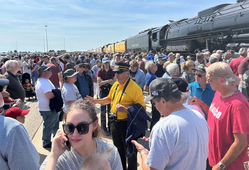 A docent talks about the history of Union Pacific's Big Boy 4014 vintage steam locomotive on Sunday, Sept. 8, 2024. An estimated 61,000 people visited the steam locomotive at the UP Global II terminal during the daylong, free event in Rochelle. The visit was part of Union Pacific’s eight-week “Heartland of America Tour,” which started Aug. 29, in Cheyenne, Wyoming, and continues across nine states.