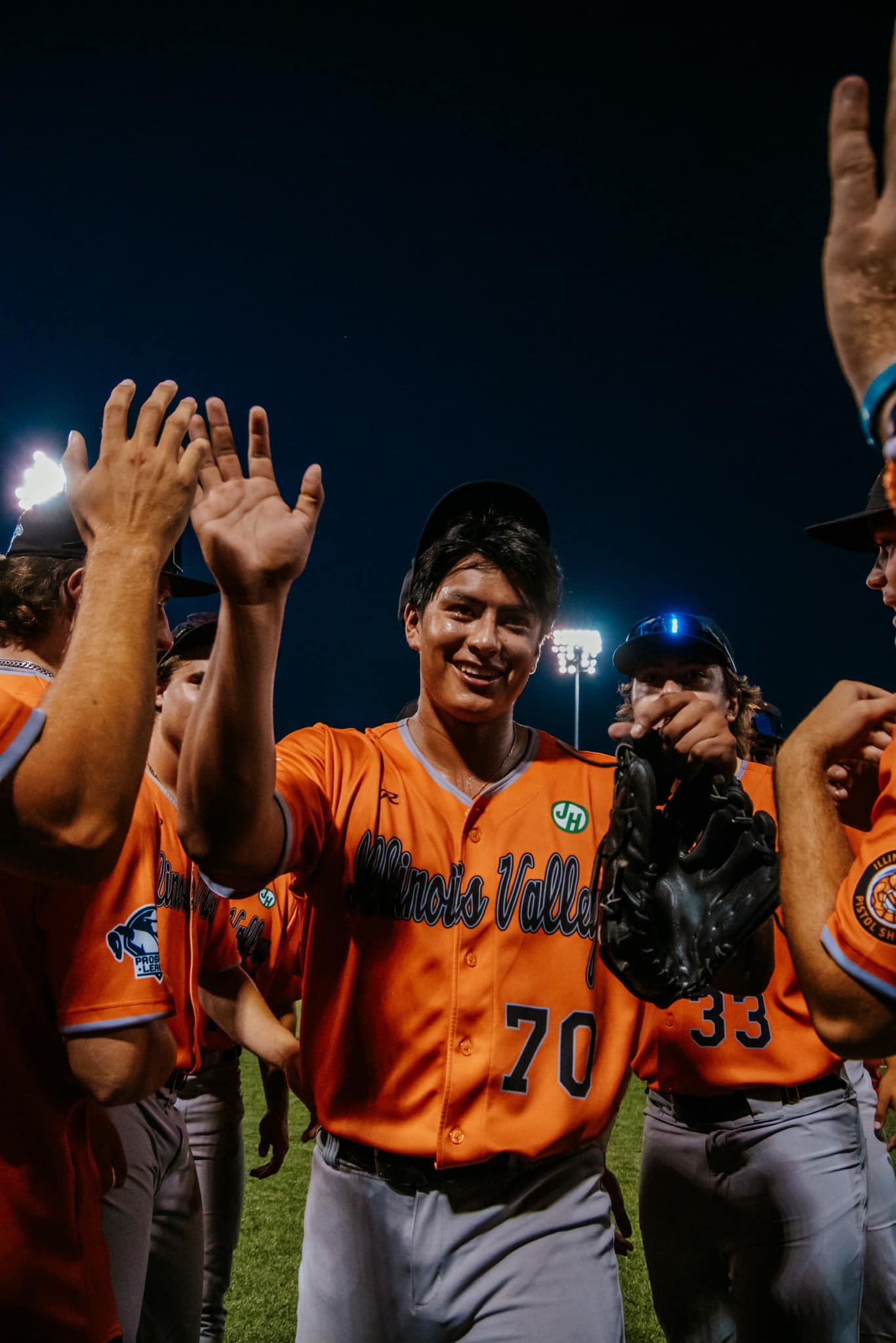 Daniel Castro (70) is congratulated by teammates during the Illinois Valley Pistol Shrimp's 13-8 victory over Rex Baseball during Game 1 of the Prospect League Championship Series on Monday, Aug. 5, 2024 in Terre Haute, Ind.