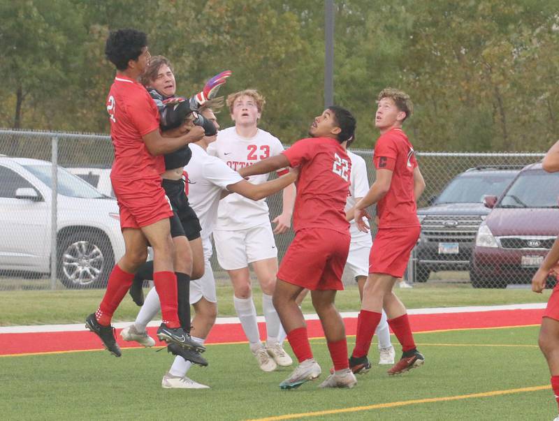 Ottawa and L-P players flood the goal on Wednesday, Sept. 18, 2024 at the L-P Athletic Complex in La Salle.