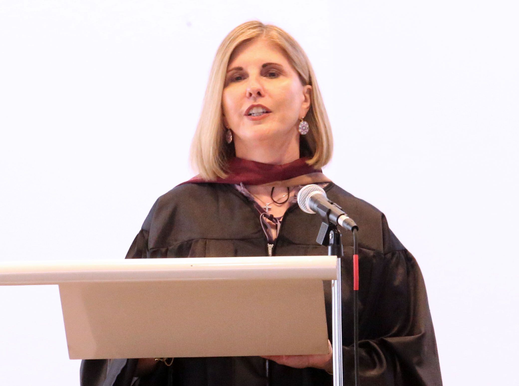 Kathy (Sale) Seegebrecht, vice president of UL Solutions, gives a speech during the Class of 2023 graduation ceremony on Sunday, May 21, 2023, in the Abbey Church at the academy.  Seegebrecht was a graduate of the Class of 1982 who majored in marketing at Northern Illinois University. UL Solutions is a global safety science company with more than 8,000 employees.