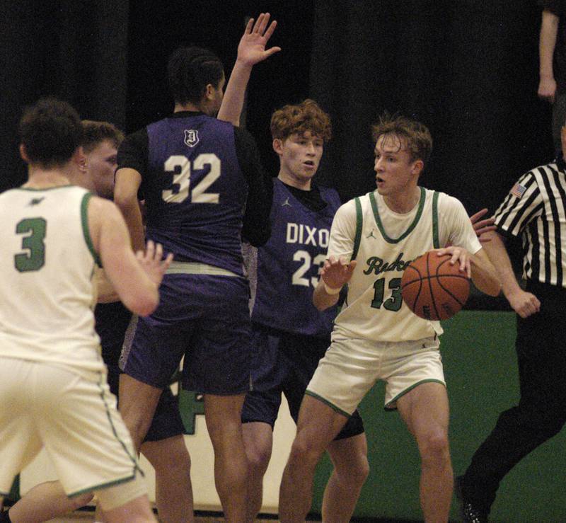 Rock Falls' Aydan Goff is met by Dixon defense during their game Tuesday, Feb. 6, 2024, at Rock Falls High School.
