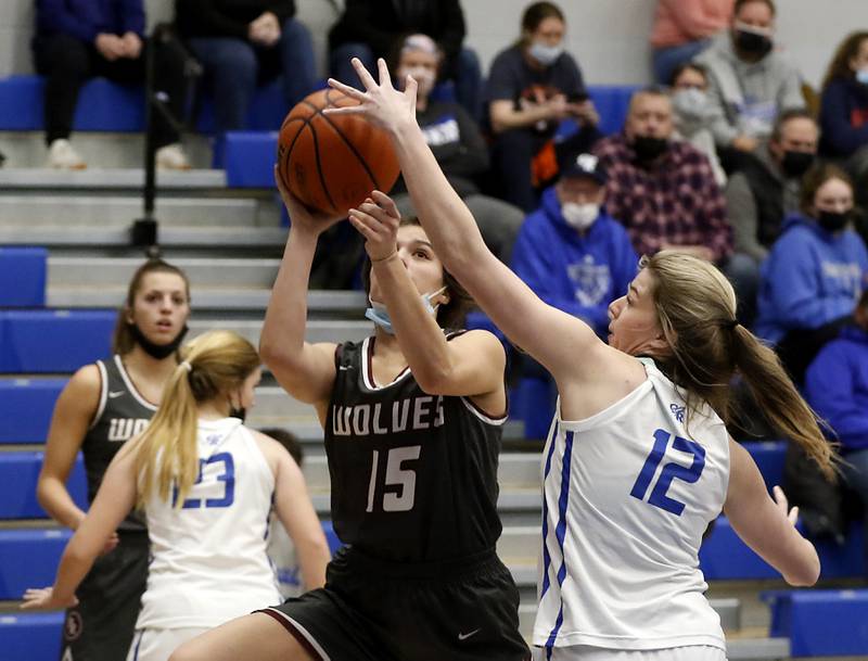 Prairie Ridge's Grace Koeppen drives to the basket against Burlington Central's Lauren Knief during Fox Valley Conference girls basketball game Monday evening, Jan. 31 2022, between Prairie Ridge and Burlington Central at Burlington Central High School.