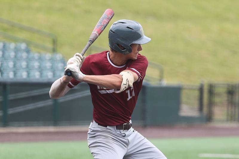 Morris’ Jack Wheeler locks in on a pitch against Highland in the IHSA Class 3A 3rd place game on Saturday June 8, 2024 Duly Health and Care Field in Joliet.