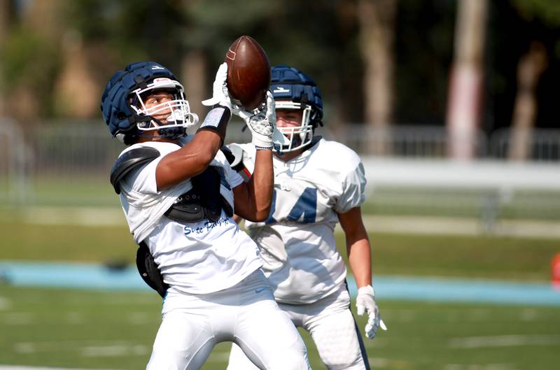 Nazareth’s Johnny Colon makes a catch during a practice on Monday, Aug. 19, 2024 at the La Grange Park School.