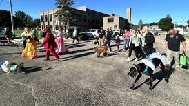 Photos: Dogs and one goat "dash" to help animal shelter