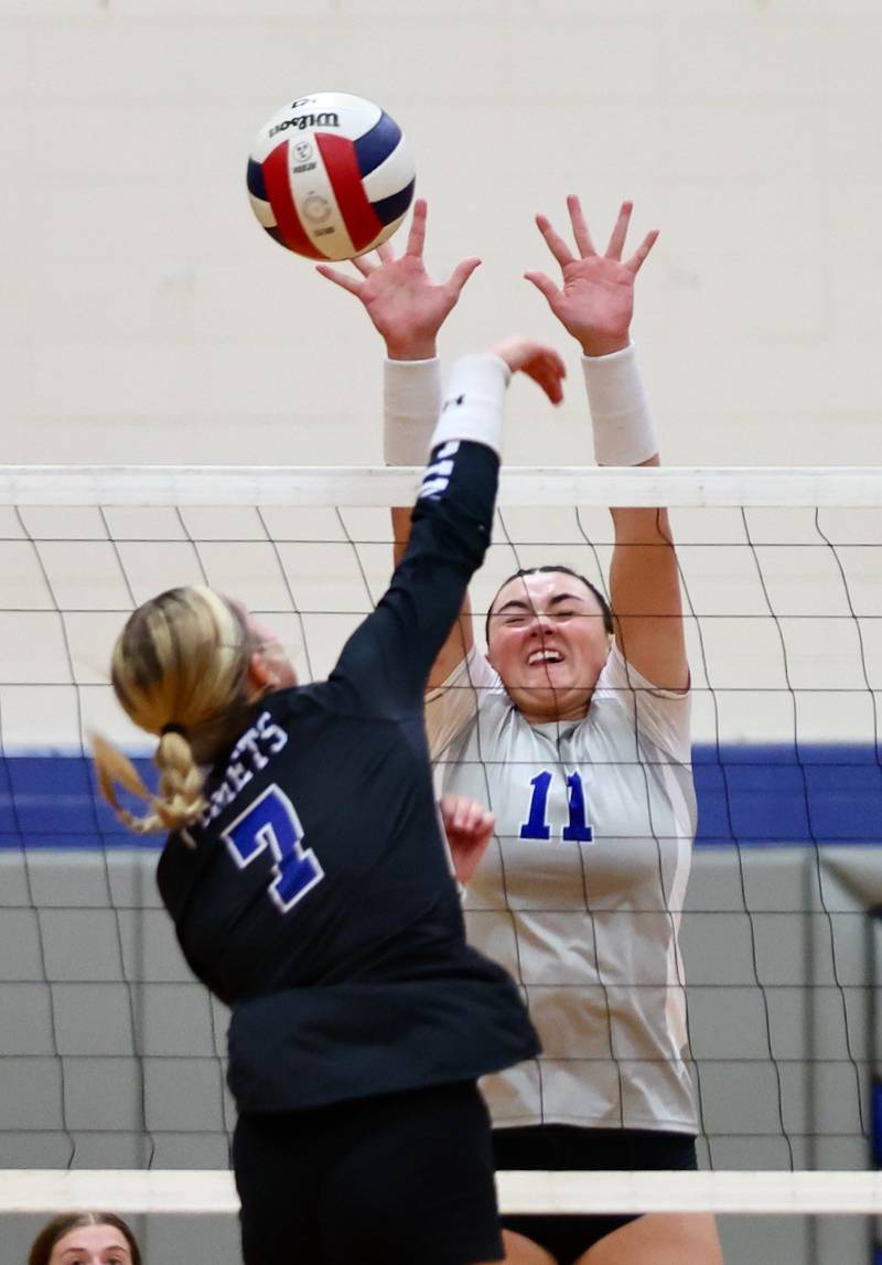 Newman's Mckenzie Duhon takes a shot against Princeton's Keely Lawson Tuesday night at Prouty Gym.