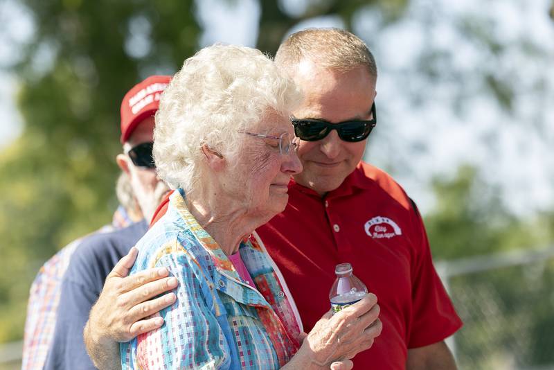 Louise Reed gets emotional with Danny Langloss following the unveiling of the sign dedicating two new courts in her and husband Larry’s name Tuesday, Sept. 17, 2024 in Dixon. Larry Reed died on May 24 of this year.