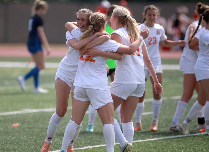 Crystal Lake Central players celebrate their Class 2A state semifinal game win over Burlington Central at North Central College in Naperville on Friday, May 31, 2024.