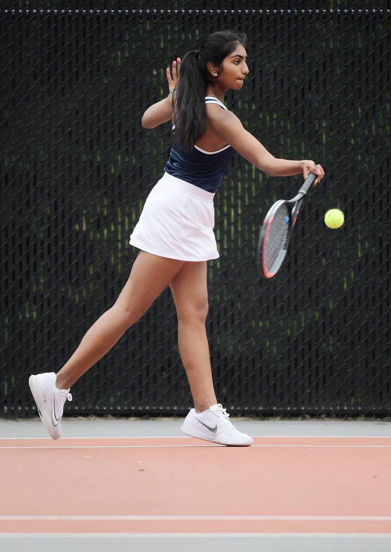 Lake Park’s Neha Murkonda  returns a shot against Batavia’s Julia Arulandu at the DuKane Conference girls tennis tournament at Wheaton Warrenville South High School on Thursday, October 5, 2023.