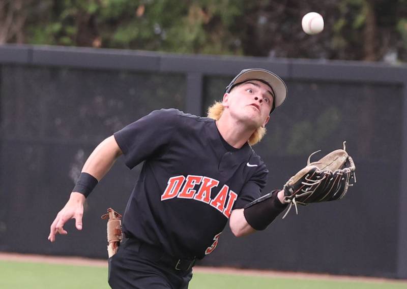 DeKalb second baseman Nikolas Nelson makes an over-the-shoulder catch in shallow left field during their Class 4A DeKalb Regional championship game against Huntley Friday, May 24, 2024, at Ralph McKinzie Field at Northern Illinois University in DeKalb.
