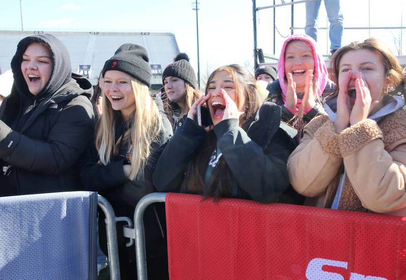 The crowd cheers on the plungers on a cold and windy Saturday, Feb 17, 2024, during the Huskie Stadium Polar Plunge at Northern Illinois University in DeKalb. The Polar Plunge is the signature fundraiser for Special Olympics Illinois.
