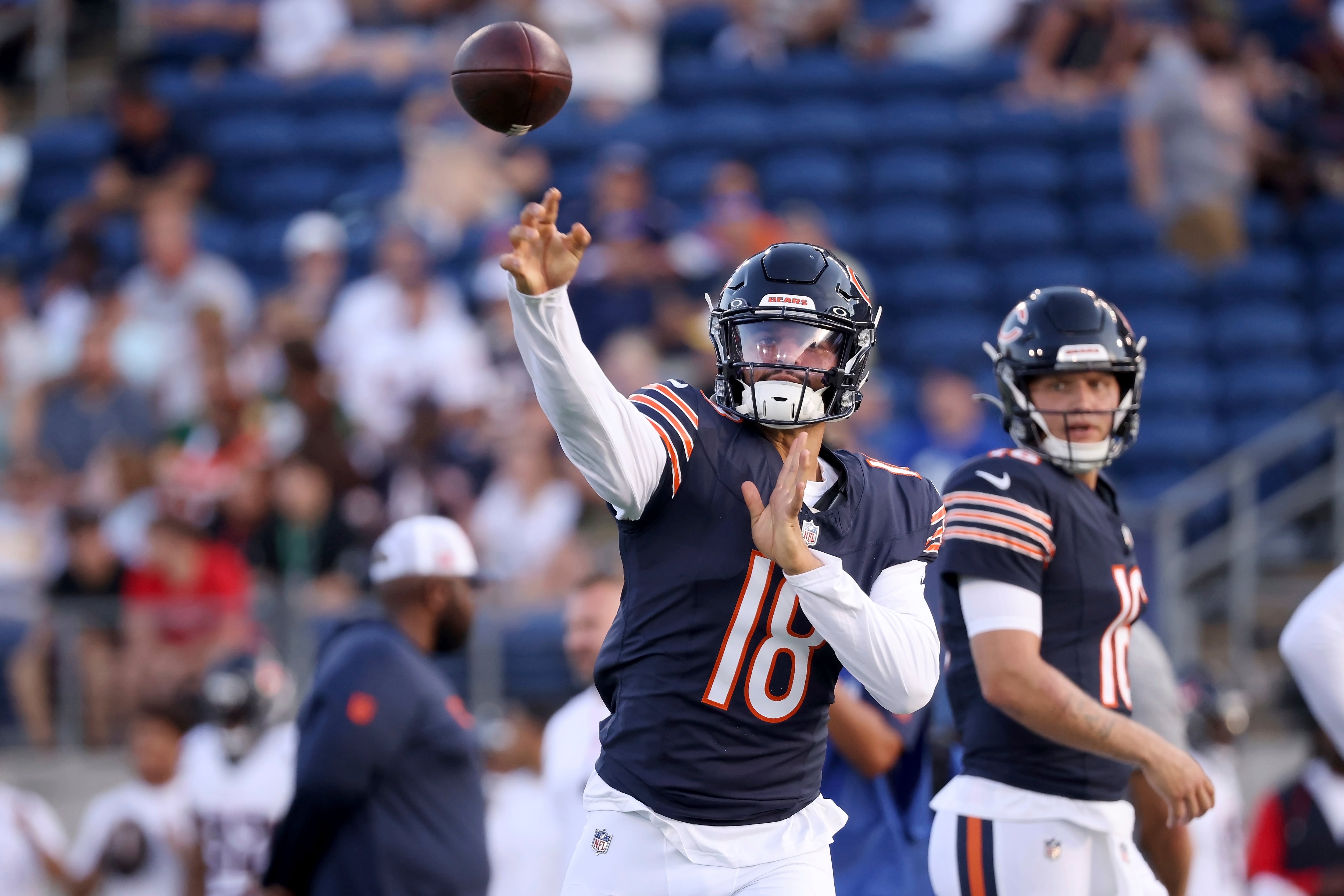 Chicago Bears quarterback Caleb Williams (18) warms up prior to the start of an NFL preseason football game against the Houston Texans, Thursday Aug. 21, 2024, in Canton, Ohio. (AP Photo/Kirk Irwin)