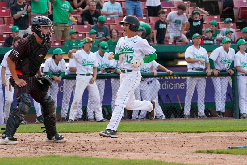 York's Drew Gami (17) scores on a error by McHenry during a class 4A Kane County supersectional baseball game at Northwestern Medicine Field in Geneva on Monday, June 3, 2024.