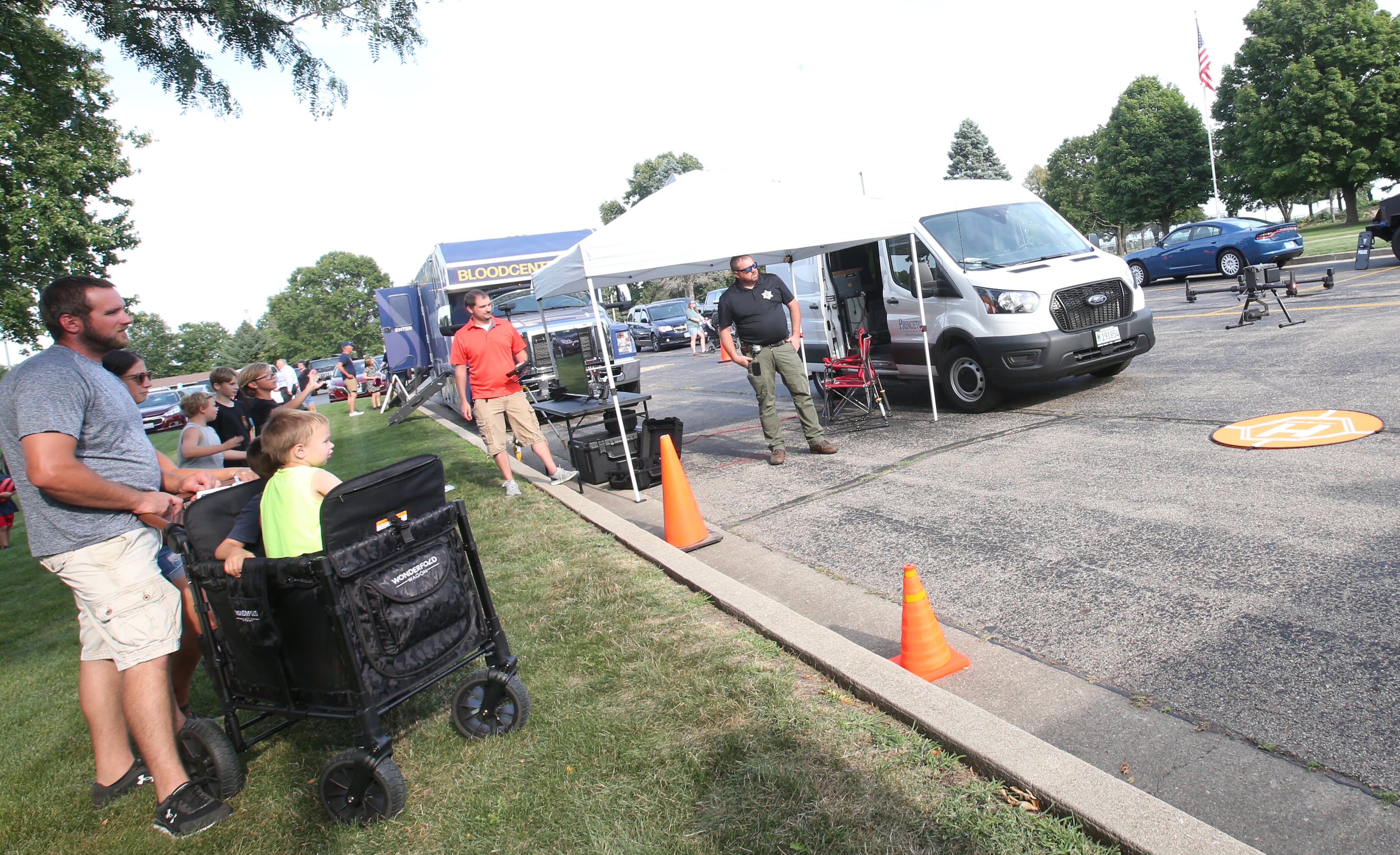 Spectators watch drone demonstrations during the National Night Out event on Tuesday, Aug. 1, 2023 at Zearing Park in Princeton.