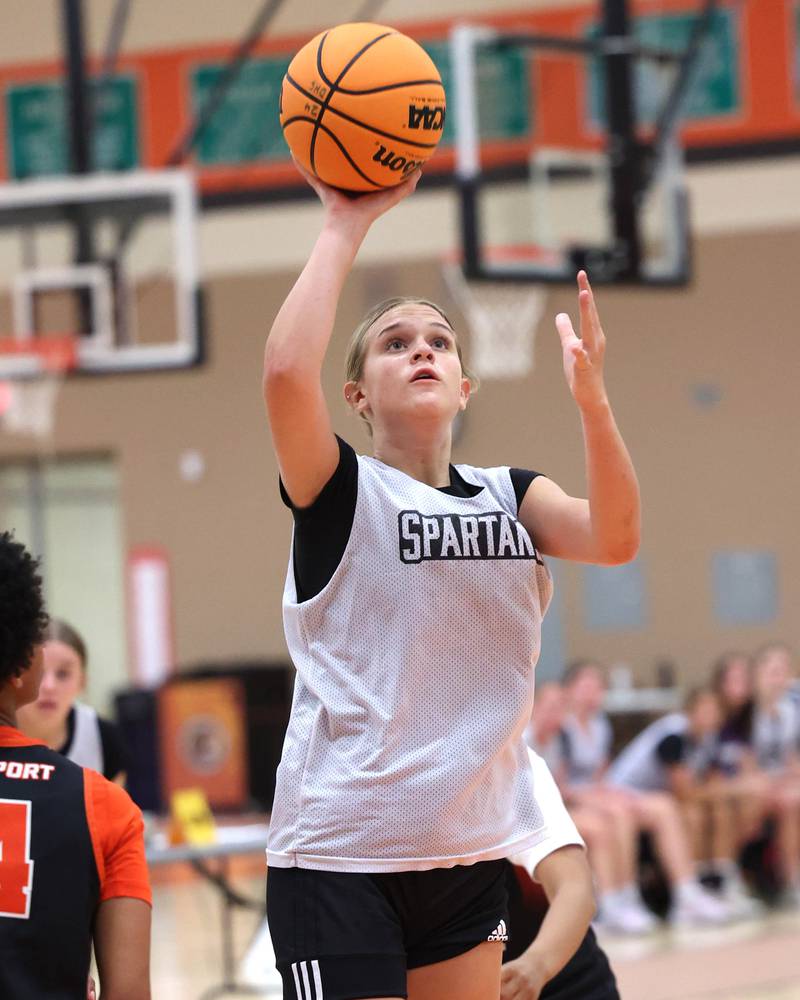 Sycamore’s Quinn Carrier scores on a layup during their summer game against Freeport Monday, June 17, 2024, at DeKalb High School.