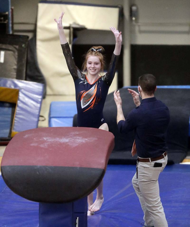 Oswego’s Sam Phillip competes on the vault during the IHSA Girls Gymnastics State Finals Saturday February 19, 2022 at Palatine High School.