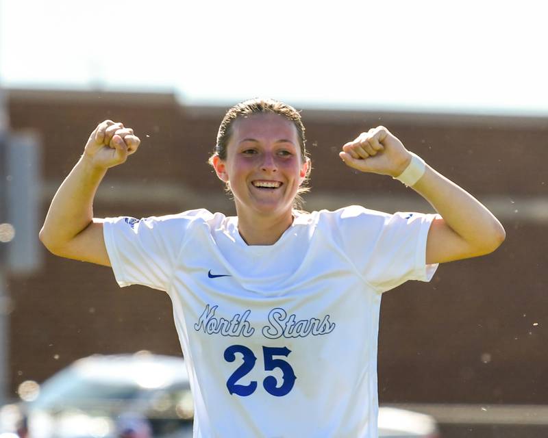 St. Charles North's Kaitlin Glenn (25) celebrates as time expires to secure a win over Wheaton North during the sectional title game held at South Elgin High School on Saturday May 25, 2024.