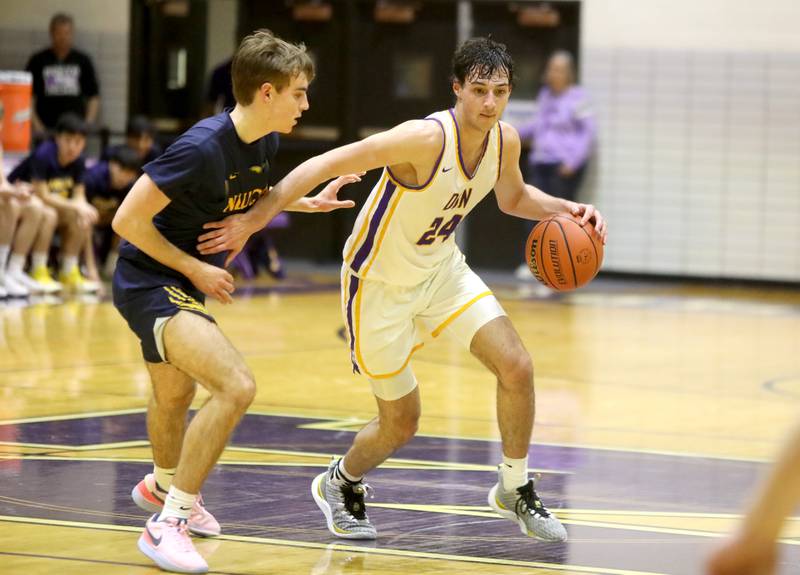 Downers Grove North’s Aidan Akkawi dribbles the ball during the Class 4A Downers Grove North Regional final against Neuqua Valley on Friday, Feb. 23, 2024.