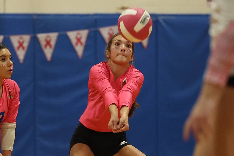 Joliet Central’s Delany Moran receives the serve against Joliet West in the annual Pink Heals cancer fundraising match on Thursday, Oct. 17, 2024 in Joliet.