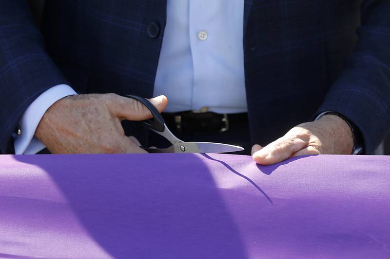 Dr. Clint Gabbard, President, McHenry County College cuts the ribbon during the opening ceremony for the Foglia Center for Advanced Technology and Innovation on Tuesday, Sept. 3, 2024, at McHenry County College.