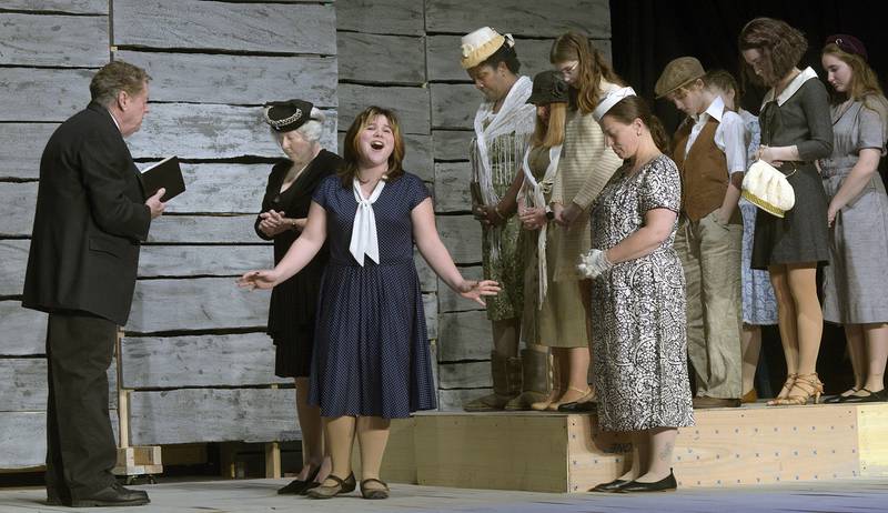 Adyssen Boaz (third from left) as Young Bonnie leads the ensemble in song during rehearsals of “Bonnie & Clyde” at Stage 212 in La Salle. The real-life story of Bonnie Parker and Clyde Barrow was adapted into a musical that scored Tony Award nominations. “Bonnie & Clyde” runs Feb. 2-4 and Feb. 9-11 at Stage 212 and is recommended for mature audiences.
