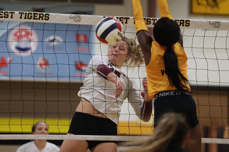 Lockport’s Jenna Kolosta powers a shot against Joliet West on Wednesday, Sept. 18, 2024 in Joliet.