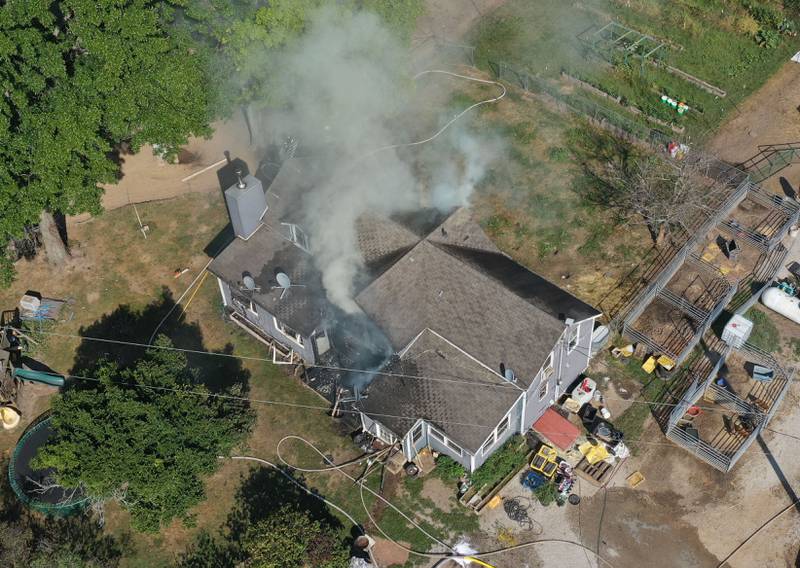 Smoke billows from a home in the 1300 block of 2500 East Street on Tuesday, Sept. 17, 2024 in rural Princeton Fire departments from eastern Bureau County were called to the scene just before 9:30a.m.