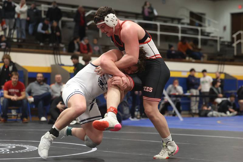 Yorkville Ben Alvarez avoids a takedown against Plainfield South’s Matt Janiak in the Southwest Prairie Conference 215 pound Championship at Joliet Central on Saturday, Jan. 20th, 2024.