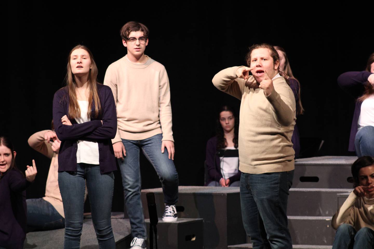 Samantha Feather is Jackie, Owen Gaffey is Leo and Logan Moreno is Frank, who deliver their lines augmented by American Sign Language during a production of "CODA" at Sterling High School's Centennial Auditorium on Wednesday.