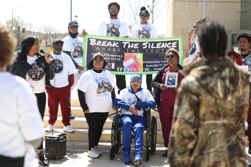 Jamal Smith’s aunt Everlean Dillard (center left), Smith's father, Wilson Smith, and Smith's mother, Charlene Edmond, gather outside Will County Courthouse to remember Jamal Smith on Monday, April 8, in Joliet.