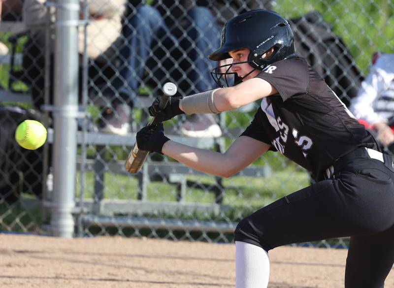 Prairie Ridge's Chloe Lieurance tries to get a bunt down during their Class 3A sectional semifinal game against Sterling Wednesday, May 29, 2024, at Sycamore High School.