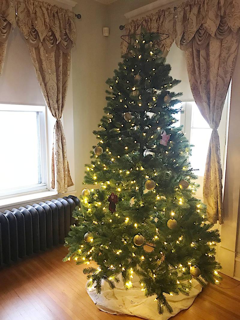 A decorated Christmas tree is seen in the east parlor of Glidden Homestead, 921 W. Lincoln Highway in DeKalb. The homestead will host a holiday open house from noon to 4 p.m. Dec. 11.