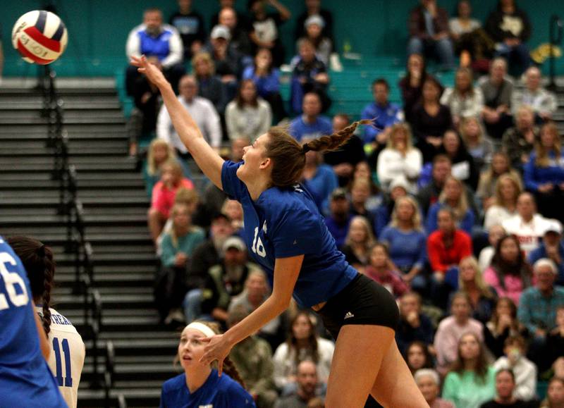 Woodstock’s Hallie Steponaitis hits the ball against Prairie Ridge in IHSA Class 3A sectional semifinal volleyball action at Woodstock North Monday.