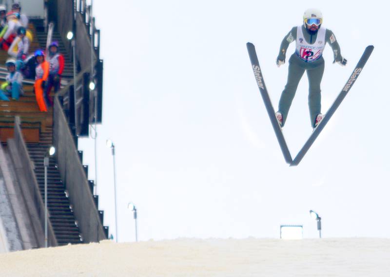 David Edlund of the St. Paul Ski Club launches during the 119th Norge Annual Winter Ski Jump Tournament in Fox River Grove Sunday.